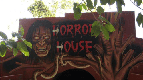 A signage of Horror House at Black Thunder, Coimbatore