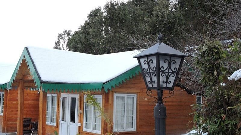 snow covered cottage at digantaa resort