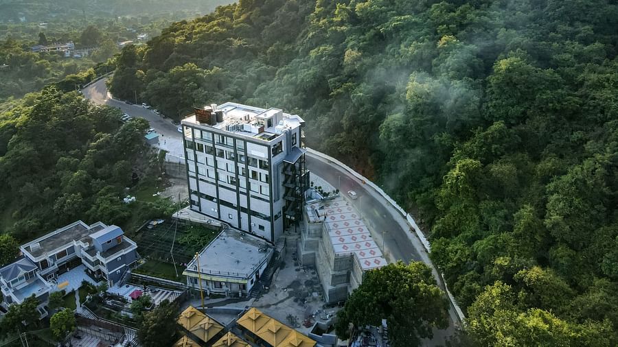 An aerial shot of a misty morning at NAMAMI BY ZENQ BANKHANDI