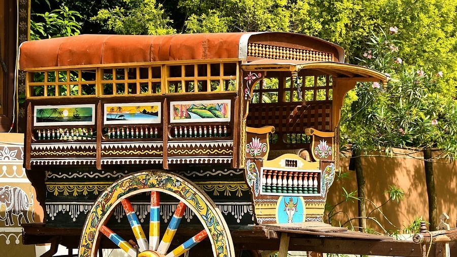 image of a wooden bullock cart at hoysala village resort, hassan