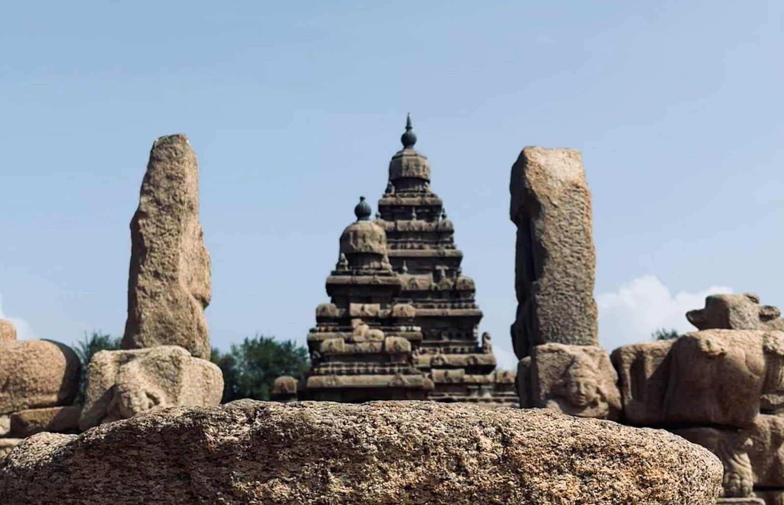 A temple seen through rocks nearby - Alibu Resort Nha Trang