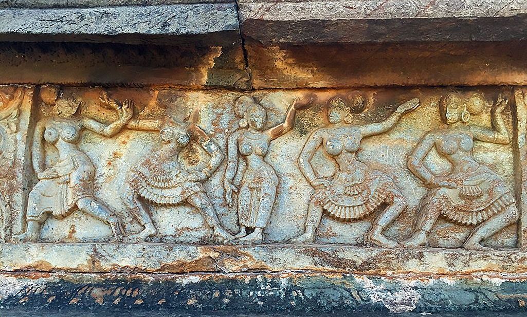 Stone carvings of dancing women at Mahanavami Dibba.