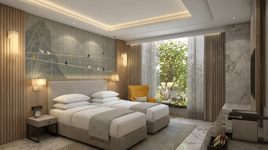 A contemporary twin room at KPG Sarovar Portico, Raj Nagar Extension, Ghaziabad, with twin beds, a recessed ceiling with lighting, and a view of trees outside.