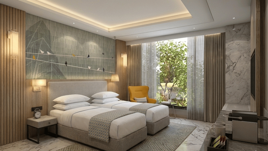 A contemporary twin room at KPG Sarovar Portico, Raj Nagar Extension, Ghaziabad, with twin beds, a recessed ceiling with lighting, and a view of trees outside.