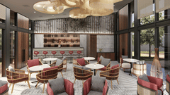 Render of a bar area at Vandhara Sarovar Premiere, Patkote, with patterned armchairs, small round tables, and large decorative circular ceiling fixtures.