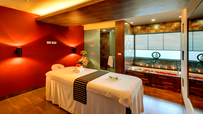 An overview of Sparoh Spa in Kolkata with a massage bed in the centre inside Kenilworth Hotel, kolkata