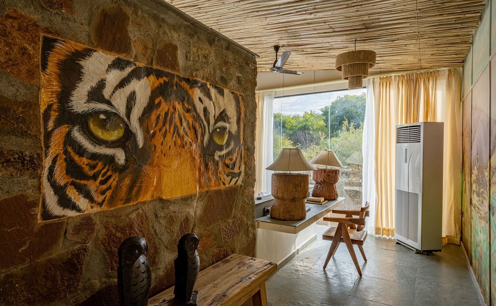 A tiger painting mounted on the wall in our rooms - Utsav Camp