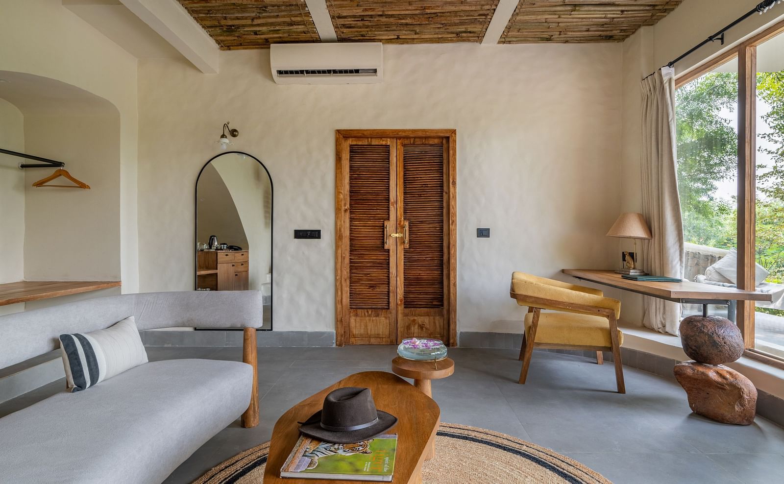 Interior view of a rustic-style living area with decor and wooden furniture.