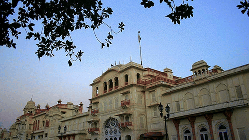 Facade of the Moti Bagh Palace and the blue sky in the background