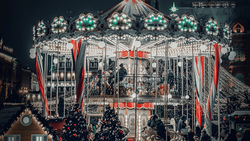 A carnival with fun rides in snow