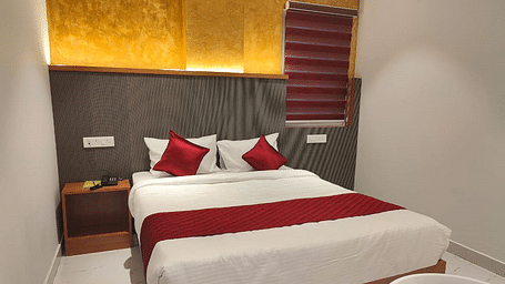 A view of the large bed at Hotel La Premier