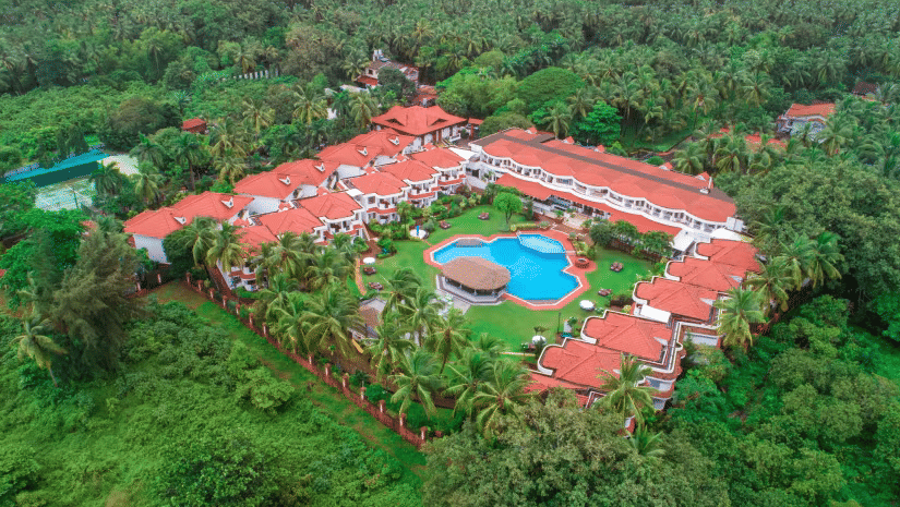 Aerial view with surrounding nature at Heritage Village Resorts and Spa - a Boutique Beach Resort in South Goa.