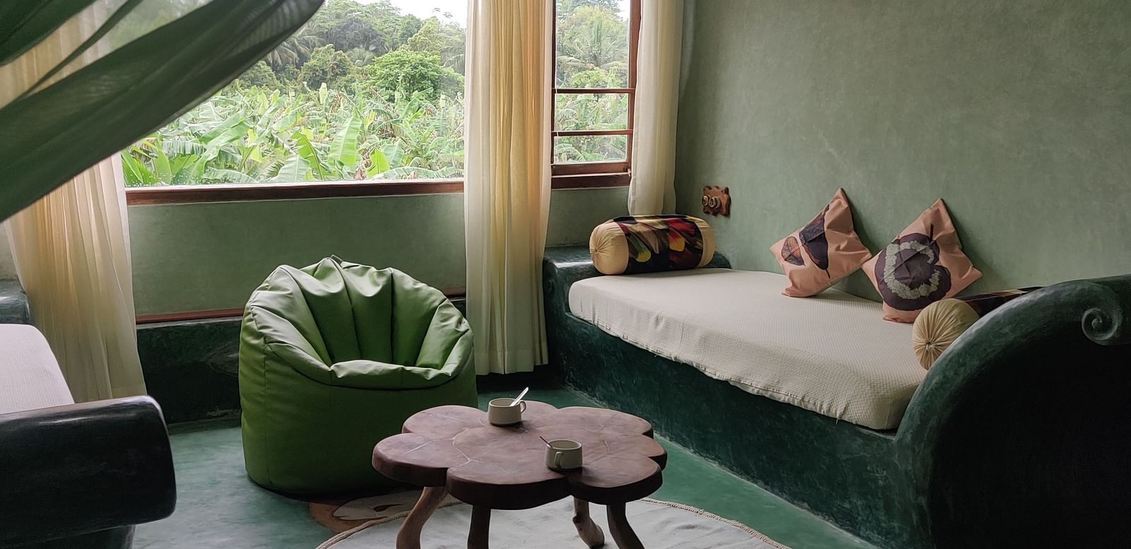 Trevally - Premium Trevally Room with diwan and a tea table and bean bag ideal for family or group stays.