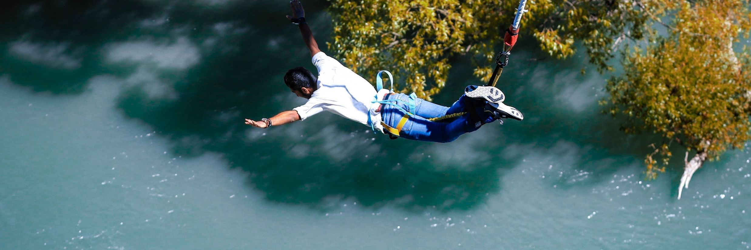 A person bungee jumping @ Lamrin Boutique Cottages, Rishikesh