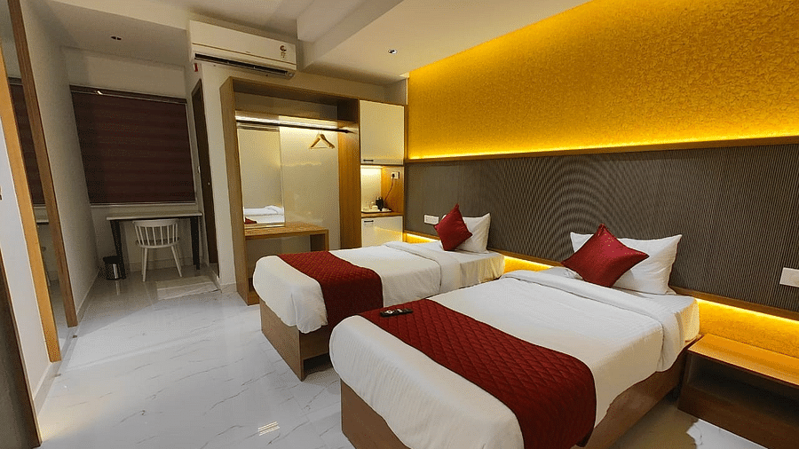 a view of the twin bed of the room at Hotel La Premier 