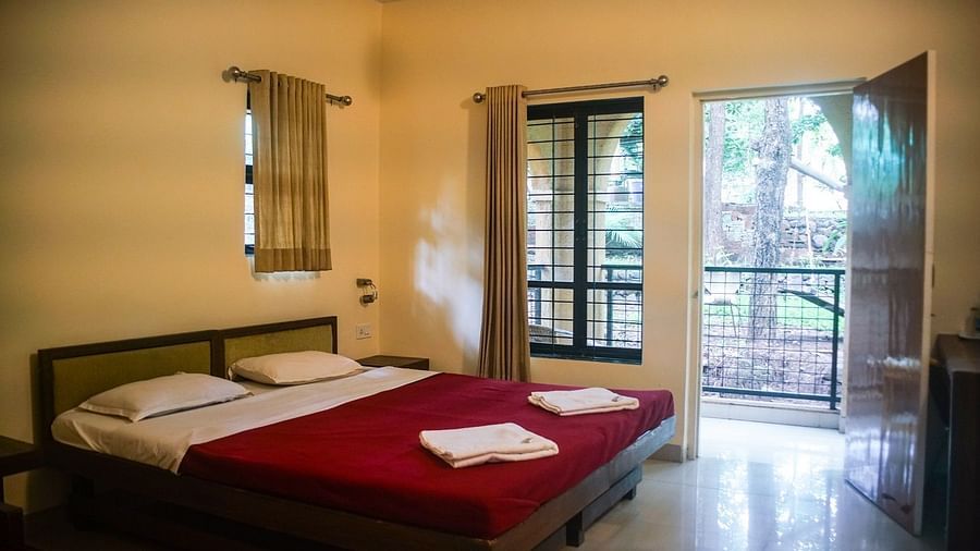 Classic-rooms interior -Classic AC Rooms at Nature Trails Sajan with modern amenities and tranquil forest surroundings.