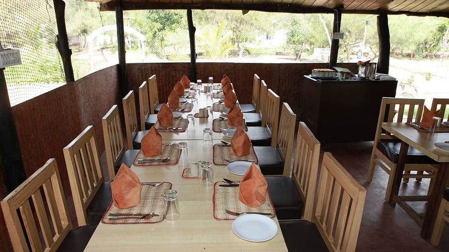 Restaurant at Lotus Eco Beach Resort Konark  with bar and seafood