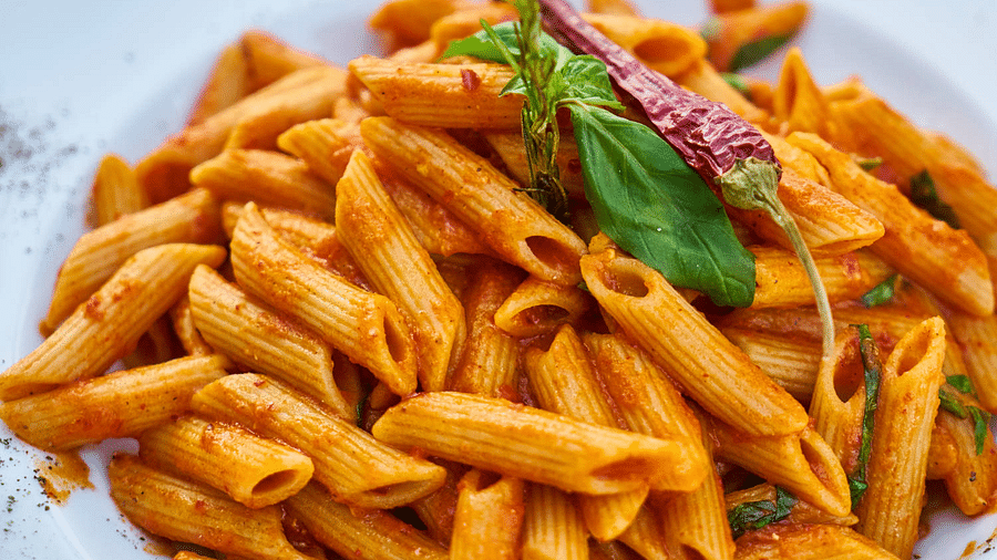 Canva - Pasta With Green Leaf And Chili Pepper zog1t0