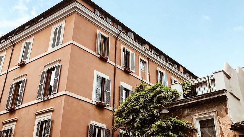 A building with a smaller building next to it