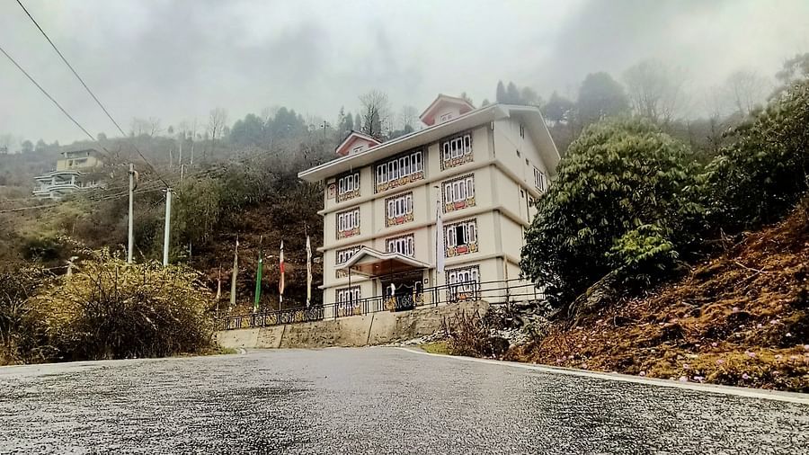 Facade of Ecotel Sonam Lachung covered in mist