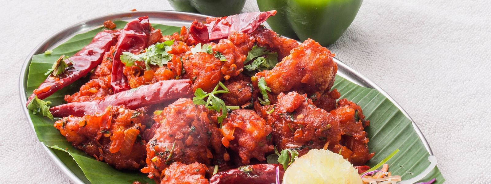 Picture featuring a plate with food in it - Hotel Pai Viceroy, Tirupati