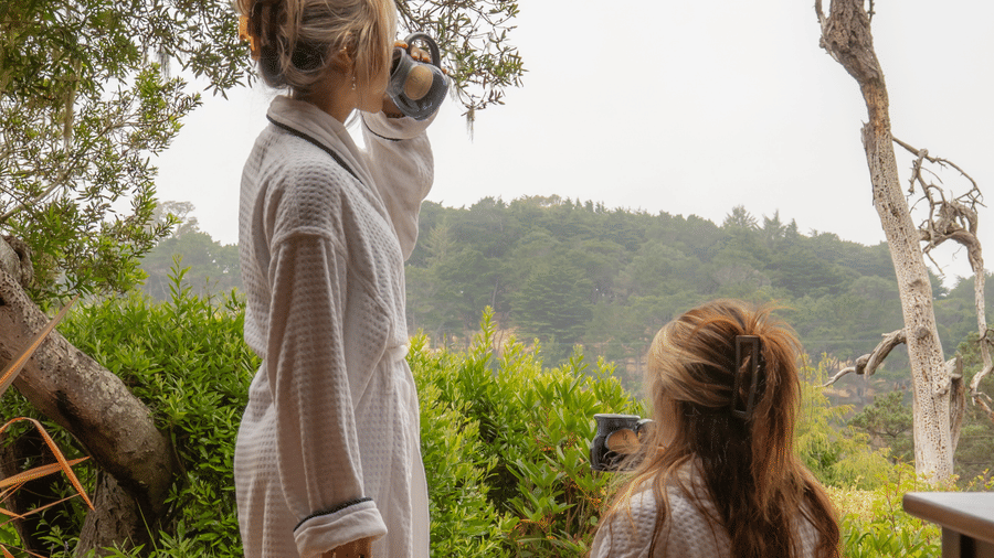 30-brewery-gulch-inn-spa-guests-in-robes-on-deck-forest-view