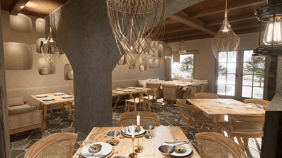 Wood-themed restaurant featuring branches, with tables and chairs arranged for guests at The Evren, Vagator.