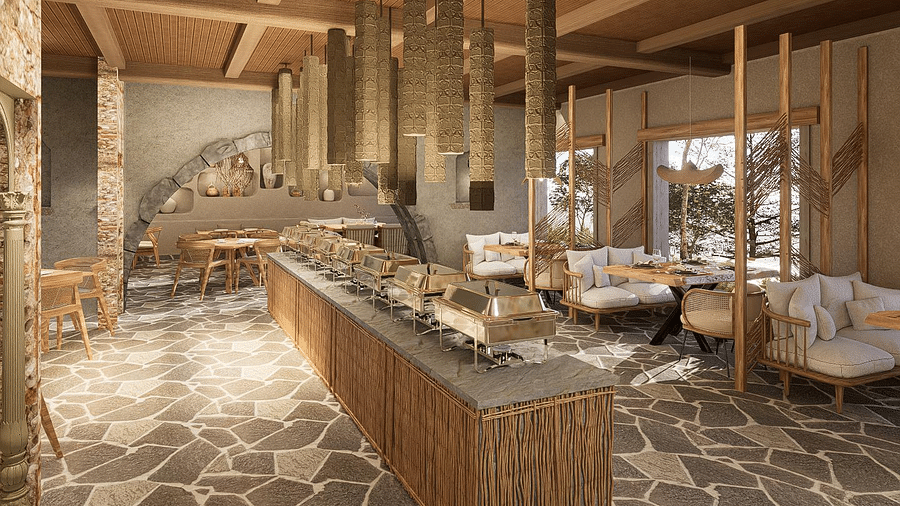 Stylish dining space with table and chair settings, enhanced by a chandelier dangling from the ceiling at The Evren, Vagator.