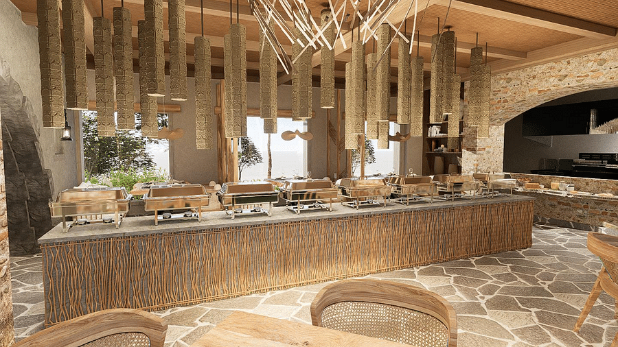 Nature-inspired restaurant with wooden accents, branches, and guest seating arrangements at The Evren, Vagator.