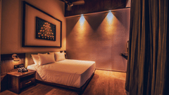 room interiors with a bed and night lights on - Symphony Samudra Beachside Jungle Resort And Spa, Port Blair
