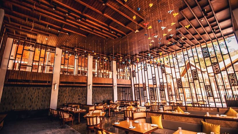 interior of the islander restaurant designed with wooden interior and inspired by the birds at Chidiya Tapu - Symphony Samudra Beachside Jungle Resort And Spa