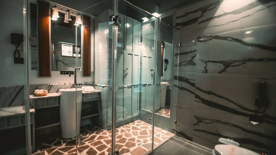 interior of a bathroom with the shower and sink area - Symphony Samudra Beachside Jungle Resort And Spa, Port Blair