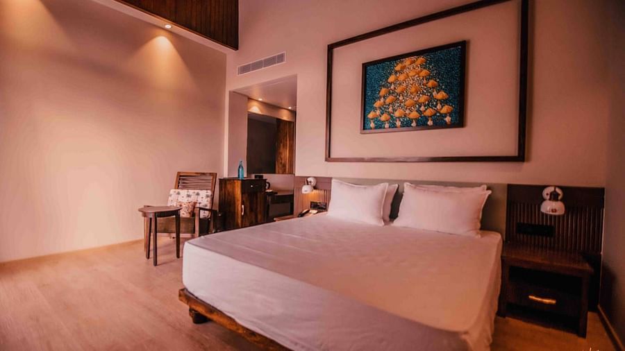 room with a king size bed at Symphony Samudra Beachside Jungle Resort And Spa, Port Blair