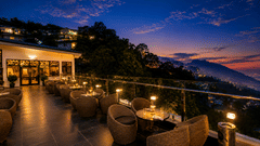 Rooftop terrace dining with stunning evening views at Pride Ashiyana Resort Mussoorie.