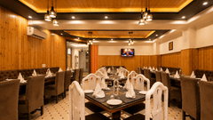 Elegant dining space offering a refined culinary experience at Pride Ashiyana Resort Mussoorie.