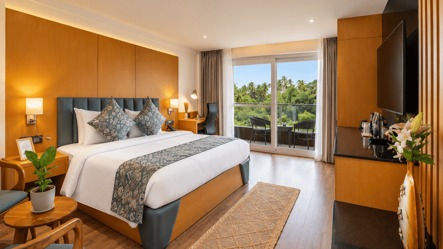 A stylish master suite with direct balcony access at BluSalzz Collection - Casa Onze, Arpora.