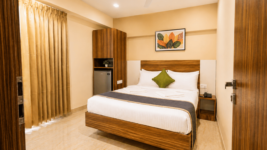 Elegant accommodation at Urban Comforts with spacious interiors, warm lighting, and modern furnishings