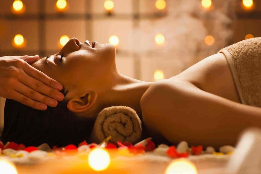 alt-text A side view of a person lying on the massage table | Sun Park Hotel & Banquet, Chandigarh - Zirakpur