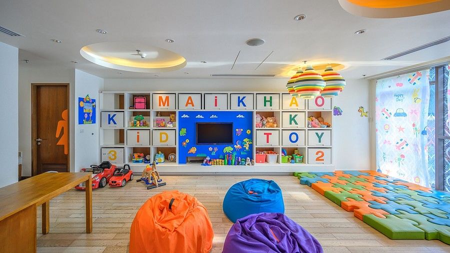 front view image of the kids club featuring a television on a blue wall - Maikhao Dream Villa Resort & Spa, Phuket