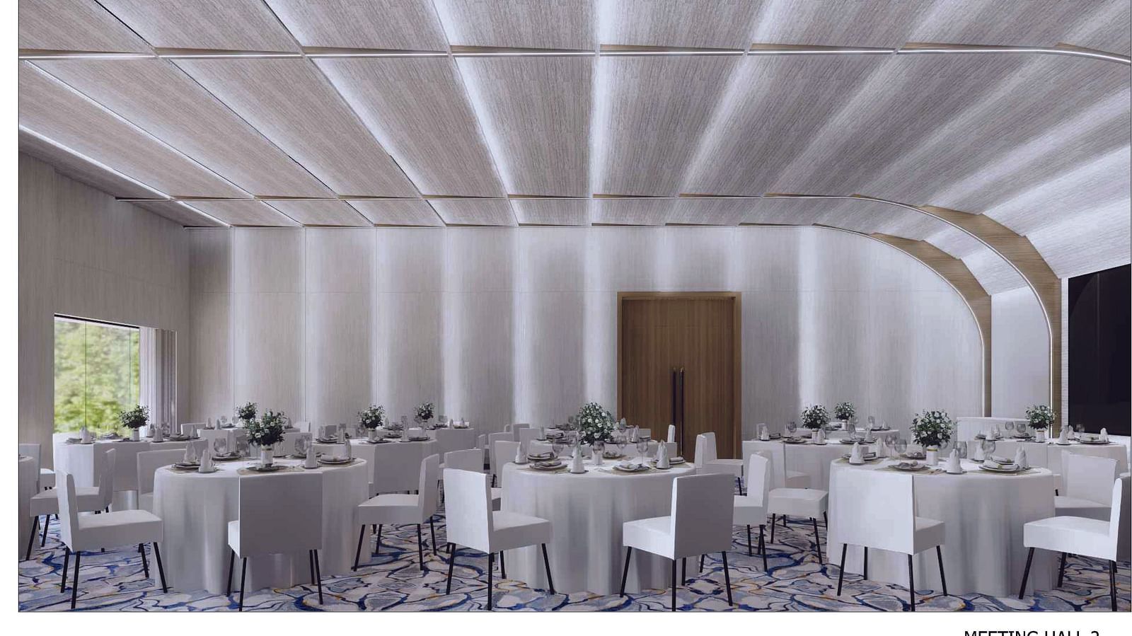 Interiors of a banquet hall with white ceiling and seating arrangement