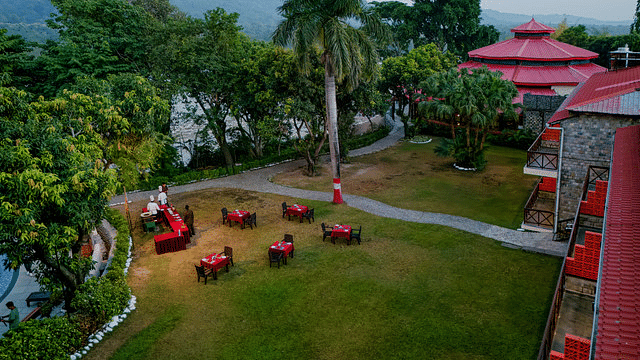 Relaxing resort grounds with comfortable outdoor seating area for guests.