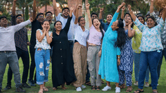 Corporate team celebrating during a company outing at MGM Beach Resorts, Chennai.