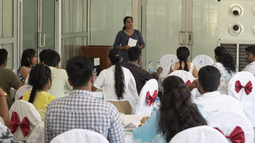 Corporate training session with employees attending a business presentation at MGM Beach Resorts, Chennai.