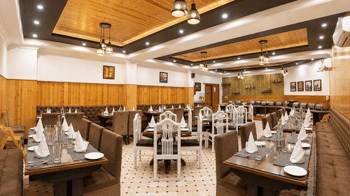 Stylish restaurant with contemporary interiors at Pride Ashiyana Resort Mussoorie.