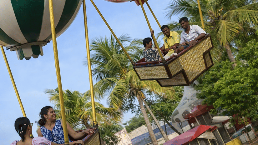 Employees enjoying an outdoor adventure activity during a corporate outing at MGM Beach Resorts, Chennai.