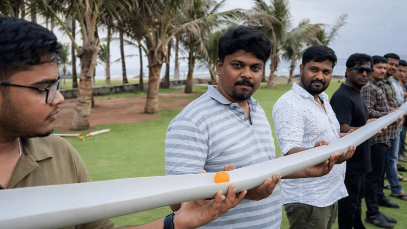 Corporate team participating in a rope-based team building activity at MGM Beach Resorts, Chennai.