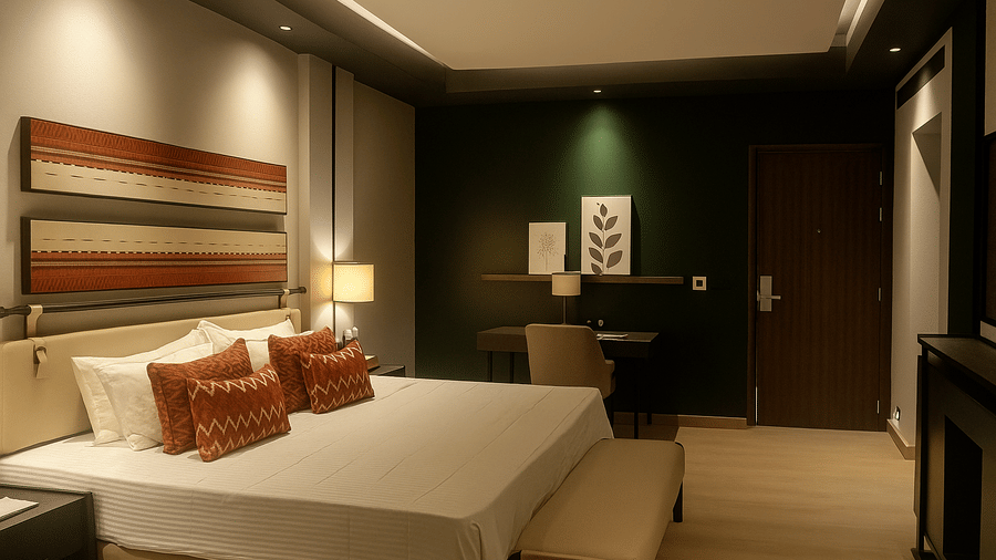 The bedroom at Hotel Polo Towers, Kohima, with dim lighting featuring a double bed in the middle of the room.