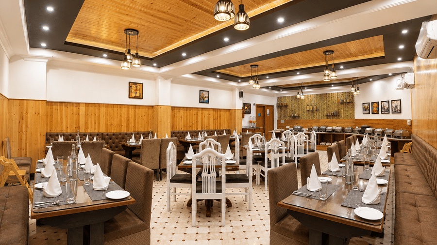 Stylish restaurant with contemporary interiors at Pride Ashiyana Resort Mussoorie.