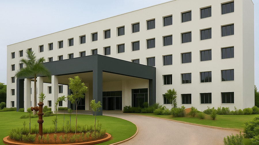 A modern, multi-story white building with a prominent dark gray entrance canopy and a landscaped circular driveway in front | Sarovar Portico, Sriperumbudur