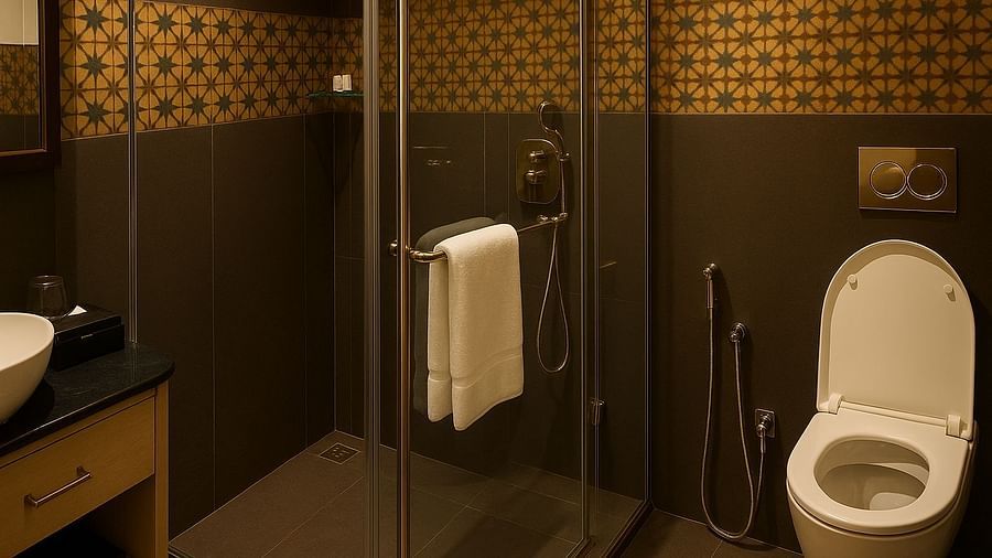 Elegant bathroom with an walk in shower and a commode at the Voyage The Solitaire Bliss.